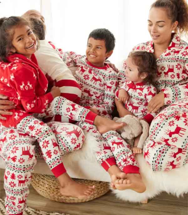 Family of 6 Wearing Matching Red and White Pajamas