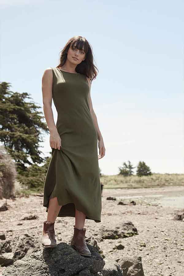 Woman wearing olive green dress 