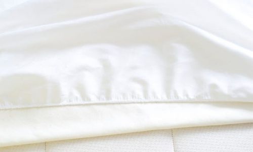 White Naturepedic Mattress Pad